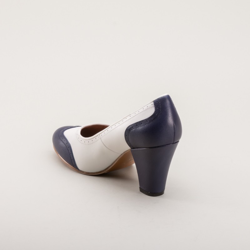 navy spectator pumps